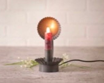 Moving flame bulb plug in tin ware reflector