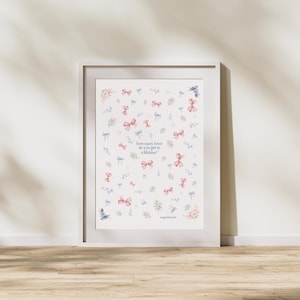 May include: A white framed print with a white background and a repeating pattern of pink and blue bows. The text "how many loves do you get in a lifetime?" is in the center of the print. The artist's name "magnolia park" is at the bottom of the print.
