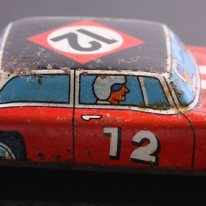 Vintage friction motor Lithograph tin &quot; Champion&quot; racer Made in Japan