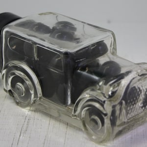 Vintage Glass car candy container with (29) Black marbles