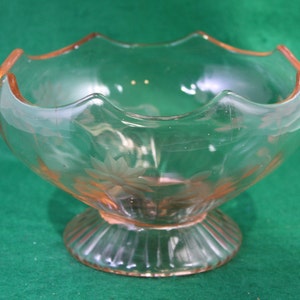 Vintage floral etched Pink Depression glass scalloped edge pedestal compote.
