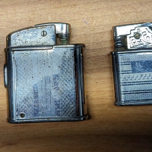 Lot of (3) vintage pocket lighter (1) missing fill cap screws.