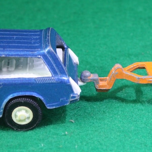 Vintage scarce  Tootsie Toy  hot rod Chev Vega sport ranch station wagon  with tootsie toy boat trailer