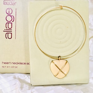 Estée Lauder Aliage Solid Perfume FAUX IVRY HEART Pendant Chocker Locket circa 1974 M.I.B. or Unboxed - Rare Collectible