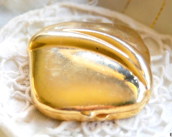 Estee Lauder Golden Sculpture by Estee Lauder circa 1986