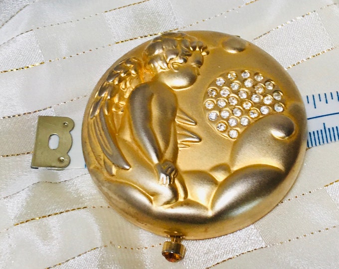 NOVEMBER ANGEL by Estée Lauder circa 1997.  ADNACHIEL Angel of Exploration
