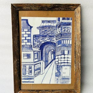 Vecchia porta d'ingresso del forte con cornice in legno, schizzo a penna blu dipinto, vecchia cornice fatta a mano per schizzo del forte di un re indiano