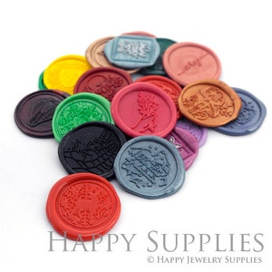 May include: Assortment of colorful wax seals with various designs, including floral, geometric, and abstract patterns. The seals are made of wax and have a shiny finish.