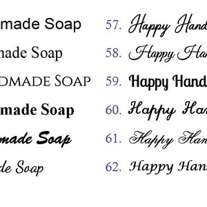 May include: A close-up of twelve different variations of the text "Happy Handmade Soap" in black ink on a white background. The text is in different fonts and sizes.