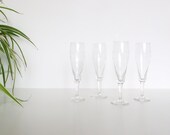 Lot of 4 flutes in chiseled crystal champagne