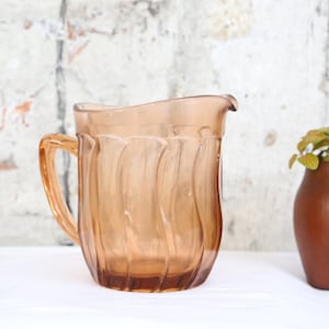Pink glass pitcher, vintage