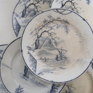 Set of 7 dessert plates, Marine de Gien model, iron earth