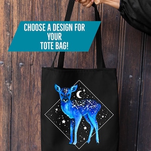 May include: Black tote bag with a blue deer design, a starry night sky, and a crescent moon within a white diamond. The teal banner reads "CHOOSE A DESIGN FOR YOUR TOTE BAG!"