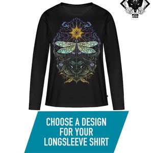May include: Black long-sleeved shirt with a detailed dragonfly design, gold sunburst, and purple, blue, and green floral elements. The shirt has the text "CHOOSE A DESIGN FOR YOUR LONGSLEEVE SHIRT". A fox logo is in the upper right corner.