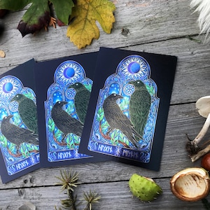 Metallic shimmering postcard -Huginn and Muninn Raven- Designed by Pixie Cold