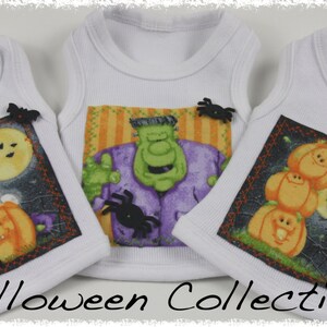May include: Three white baby onesies with Halloween-themed designs. One features a Frankenstein's monster, another a ghost in a pumpkin, and the third has stacked pumpkins. The words "Halloween Collection" are at the bottom.