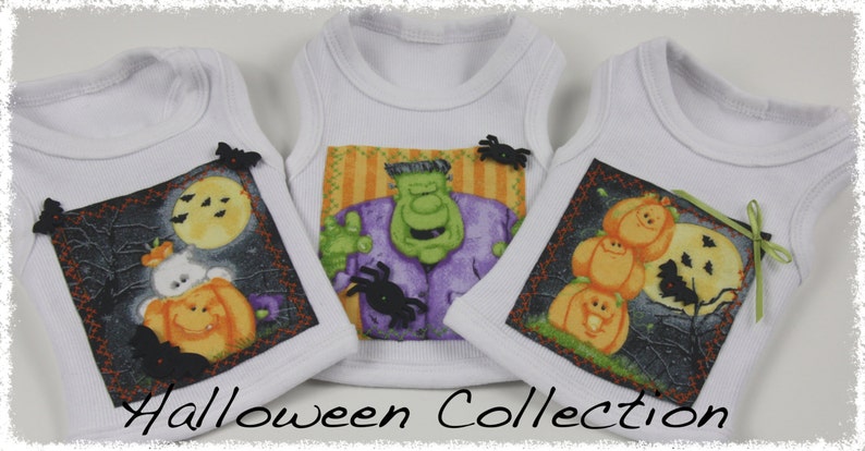 May include: Three white baby onesies with Halloween-themed designs. One features a Frankenstein's monster, another a ghost in a pumpkin, and the third has stacked pumpkins. The words "Halloween Collection" are at the bottom.