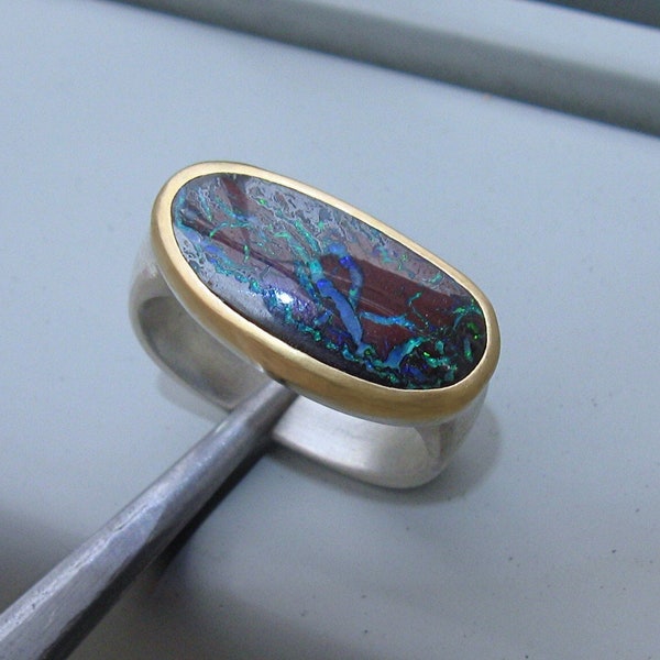 Ring with boulder opal in gold and silver