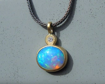 Anhänger mit Opal und Diamant in 750er Gold und Silber