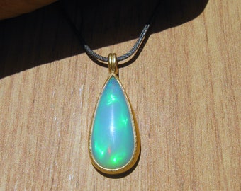 Opal Anhänger in 750er Gold und Sterlingsilber