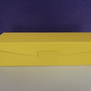 Opbergdoos / gele kartonnen doos / geschenkverpakking voor kaarsen
