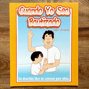 May include: A yellow and blue illustrated book titled "Cuando Yo Sea Bautizado" by Edgar González. The book features a cartoon illustration of a person being baptized by another person in water. The book is described as "Un divertido libro de colorear para niños."