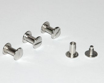 May include: Four silver metal screw-type fasteners with a flat head and a threaded shaft. Two of the fasteners are assembled with a washer and a nut. The other two fasteners are disassembled with the washer and nut separate.