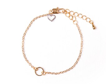 Gold-plated bracelet with small ring charm handmade in Montreal