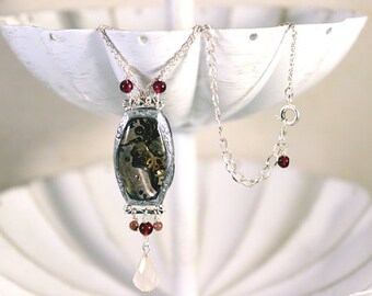 Rosealia's Timestop - resin, garnet, and tourmaline steampunk necklace