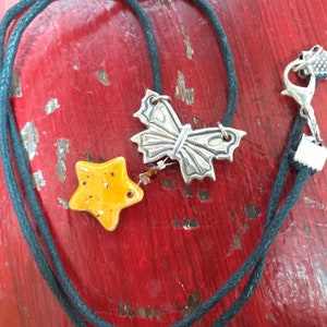 Pendentif étoile et papillon