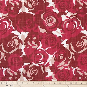 May include: Red and white fabric with a repeating pattern of large stylized roses. The fabric has a textured, linen-like appearance.
