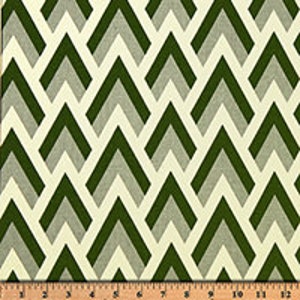 May include: Green and gray geometric pattern fabric with a white background. The pattern is made up of repeating chevron shapes.