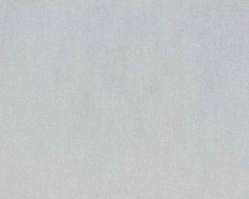 K&ouml;nnte beinhalten: Ein einfarbiger, hellgrauer Stoff mit einer dezenten, gewebten Textur.
