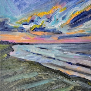 May include: A painting of a seascape with a beach in the foreground. The sky is a vibrant blue with streaks of yellow, pink, and purple clouds. The water is a light blue with white waves. The beach is a dark green with a few light green streaks.