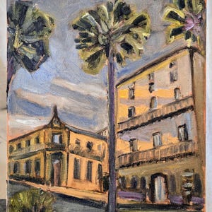 May include: A painting of a street scene with two buildings, palm trees, and a cloudy sky. The buildings are yellow with windows and balconies. The palm trees are green and have brown trunks. The sky is a light blue with white clouds.
