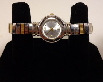 Ladies Quartz Two Tone Sliver and Gold Watch With Stretchable Two Tone Wrist Band
