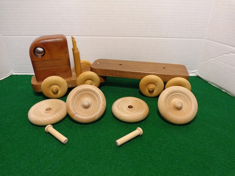 Wooden Toy Wheels And Axle Pegs 4 2 3 Image 0