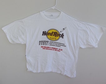 Vintage T-shirt Hard Rock Cafe Iraq Large 1990s Fido Dido appears in the back