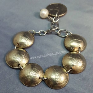2006 South Dakota domed state quarter bracelet Mt. Rushmore and pheasant