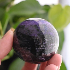 Charoite sphere with flash rare gemstone purple crystal ball with black