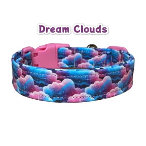 May include: A pink and blue dog collar with a cloud pattern and the text "Dream Clouds".