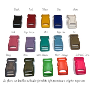 May include: A collection of 15 plastic buckle clips in various colors, including black, red, yellow, blue, white, pink, light purple, mint, light blue, tan, gray, olive, neon green, neon orange, and hot pink. The buckles are arranged in three rows of five.