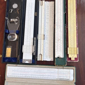 Collectibles job lot 6 physics engineering slide rules//  Castell Elektro slide rule made in Germany, BRL Janus series made in uk and more
