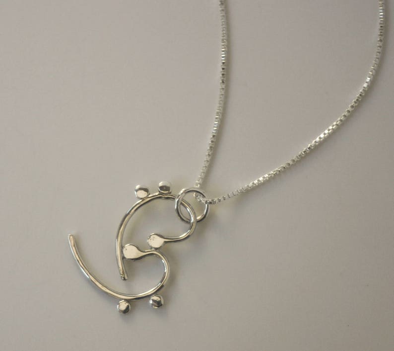 Handmade Silver Musical Pendant Abstract Bass Cleffs