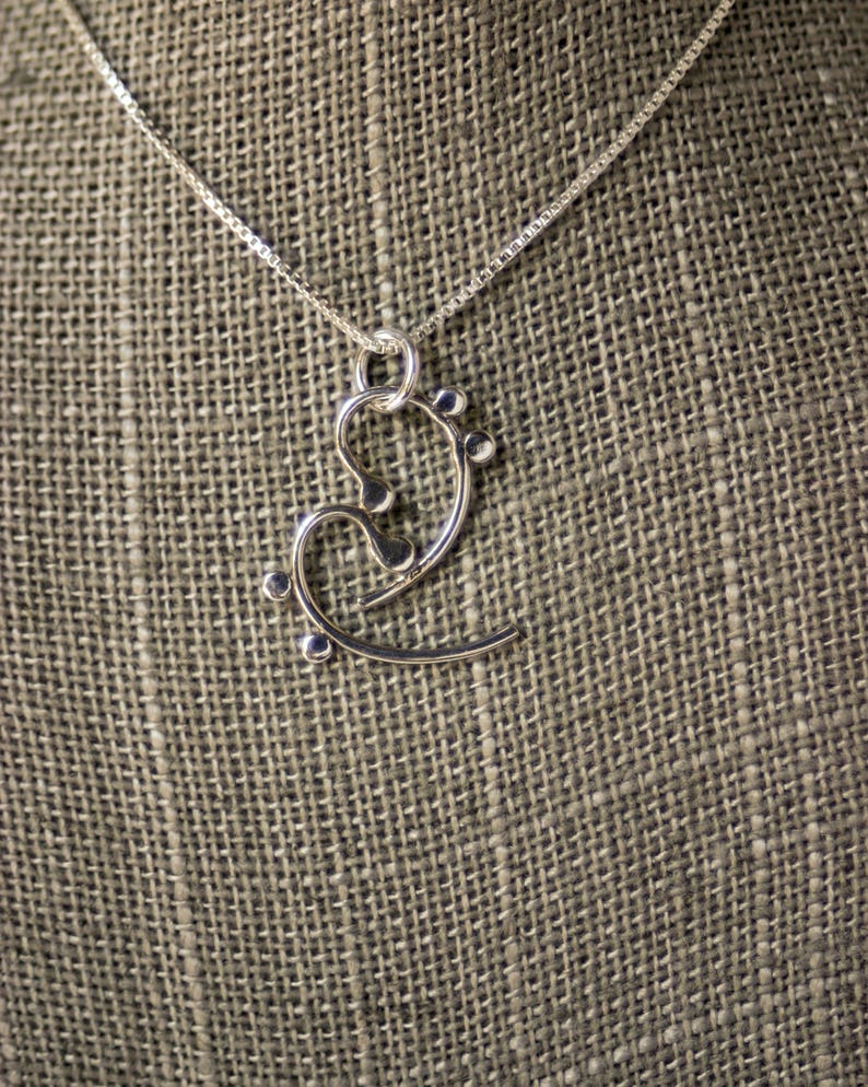 Handmade Silver Musical Pendant Abstract Bass Cleffs