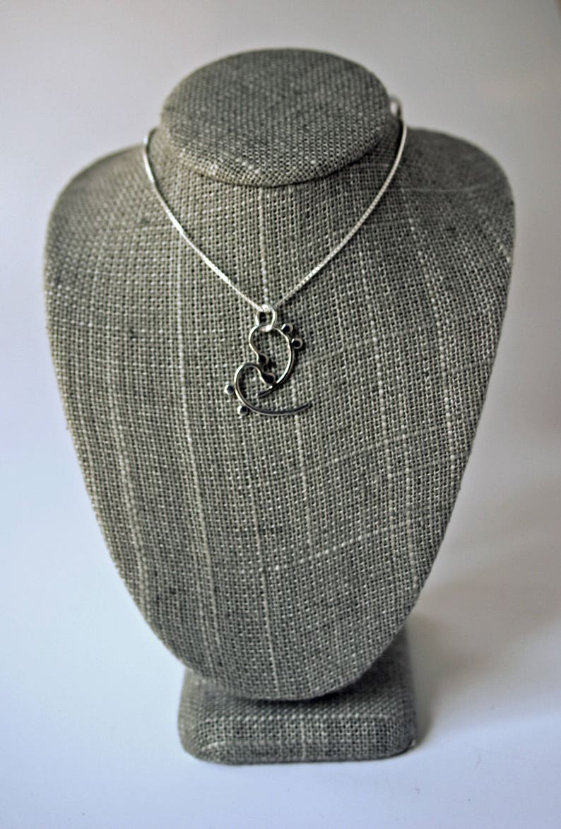 Handmade Silver Musical Pendant Abstract Bass Cleffs
