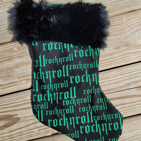 Rock and roll, black and green, fully satin lined, and faux fur trimmed 17 inch Christmas stocking