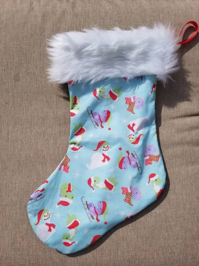 17 inch Christmas dinosaur blue fully lined fur trimmed stocking