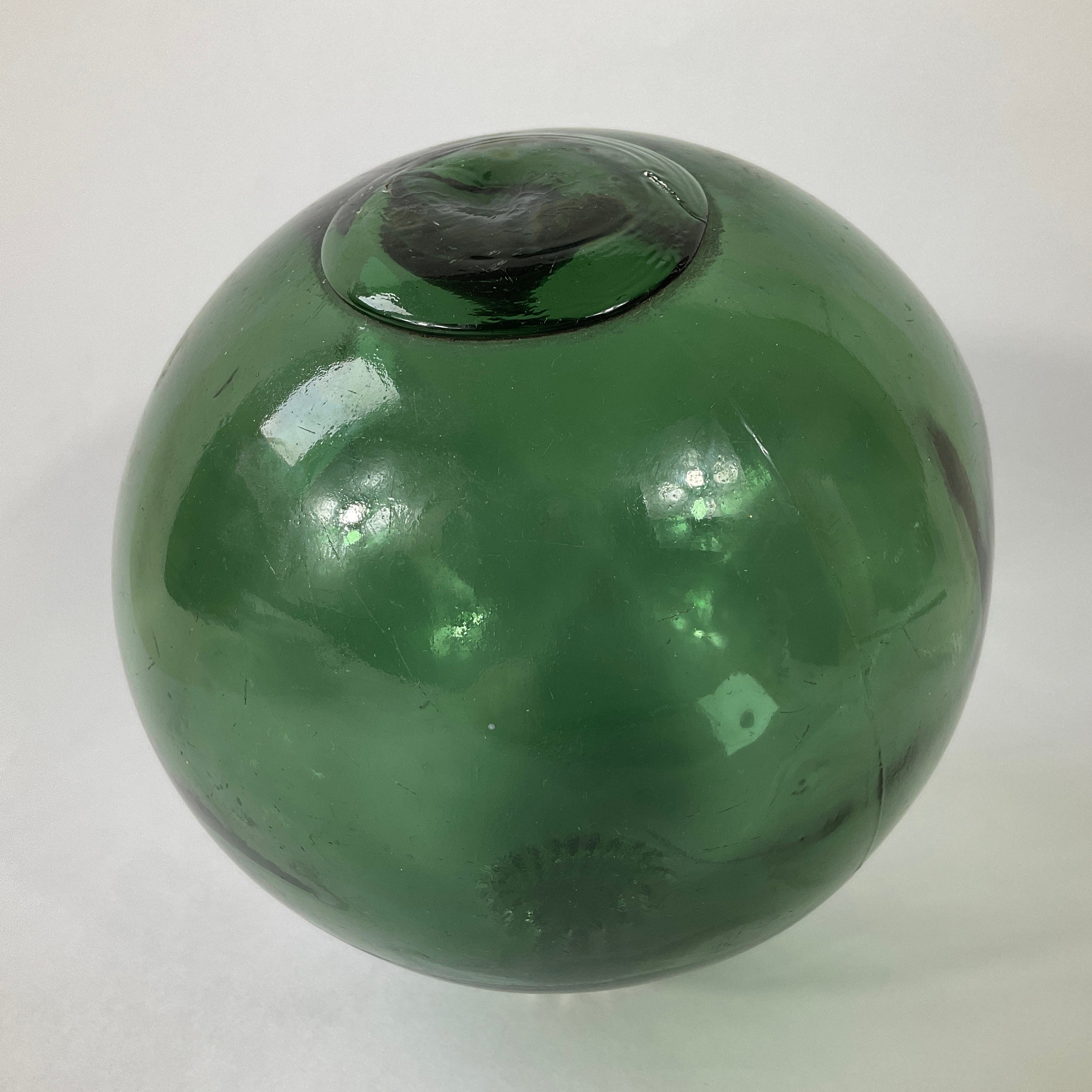 Sold at Auction: Vintage green glass fishing float, with rope covering.  22cm in Dia Approx.