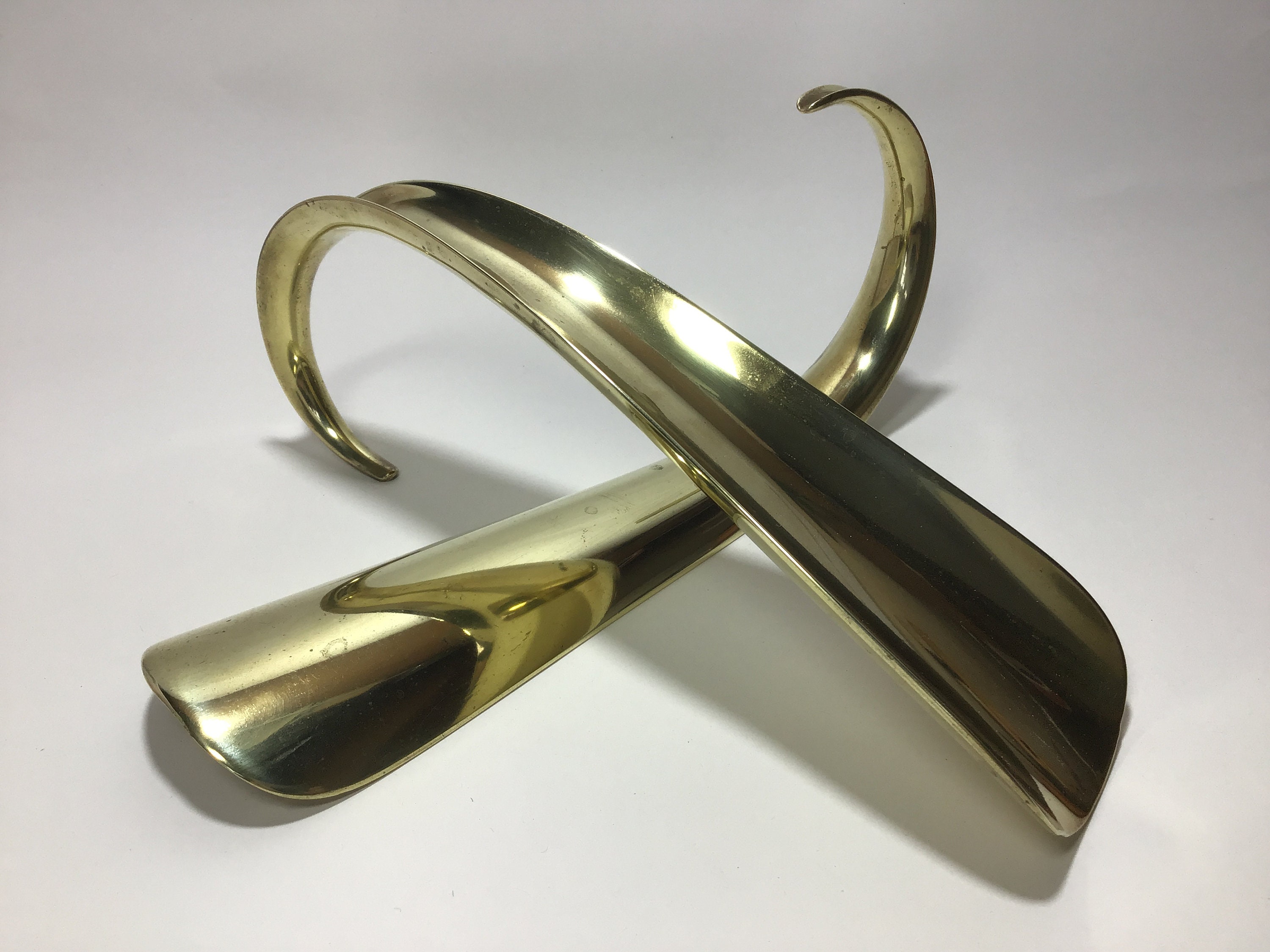 Vintage brass shoe horn store